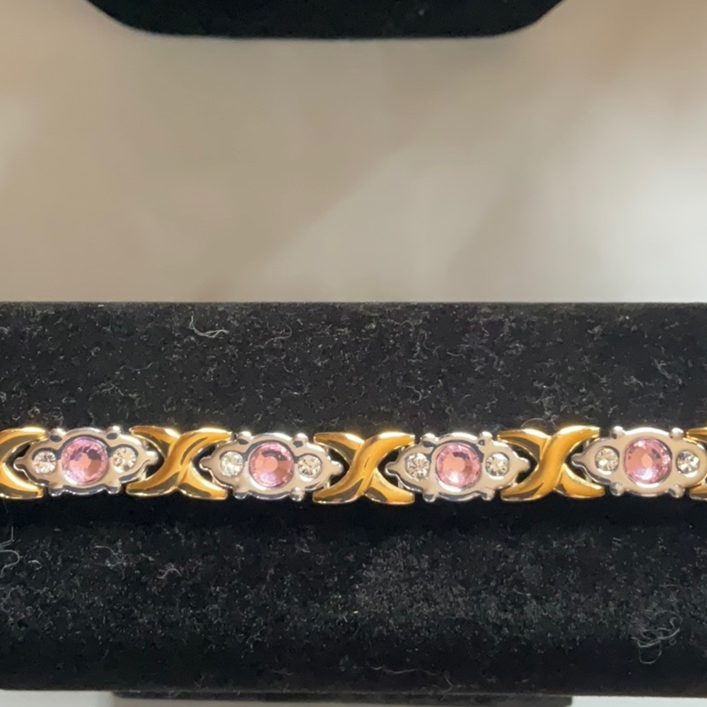 Elegant Gold and Silver Bracelet with Pink Accents